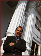 Image of Chris Carrozzella in front of columns