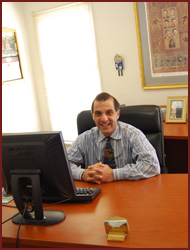 Image of Christopher Carrozzella at his desk